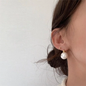 925 silver stud earrings with large white pearl pendant and small gold bead accents