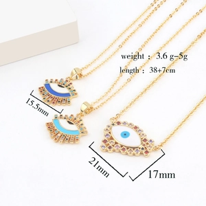 Detailed specs of gold Evil Eye heart necklaces with enamel inlay and zircon accents