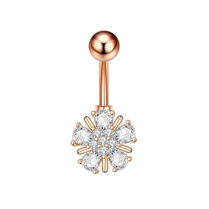 Detailed view of rose gold navel ring featuring a blooming zircon flower pendant