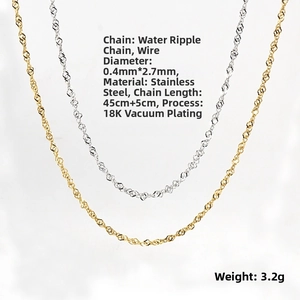 Macro detail of 18K gold plated stainless steel water wave chain showing 0.4mm links