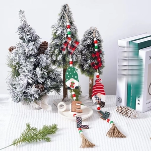 Christmas wooden bead garland with gnome charms, NOEL and JOY letters, and jute tassels