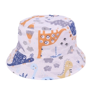 Detail of white children's bucket hat featuring colorful dinosaur cartoon print
