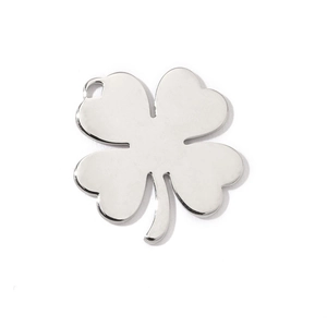 Close-up of a silver four-leaf clover pendant in polished stainless steel for DIY jewelry