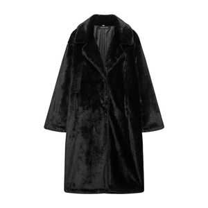 Detailed close-up of premium black faux fur texture and lapel of the long winter coat