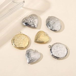 Polished stainless steel heart and oval locket pendants with vintage floral embossing