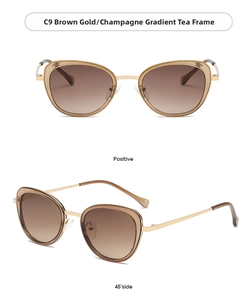 Detail of cat-eye sunglasses with champagne gold frames and brown gradient lenses