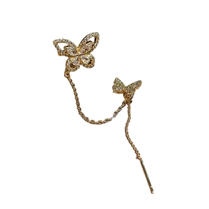 Gold butterfly ear cuff with sparkling zircon crystals and delicate long chain