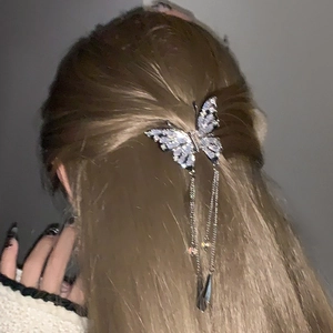 Elegant silver butterfly hair claw clip with rhinestones and tassel chains for women