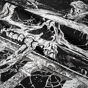 Close-up detail of black and white manga tapestry fabric showing fine texture and art print