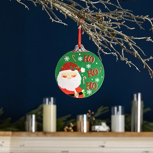 Christmas tree ornament with Santa Claus and HO HO HO text on green round tag