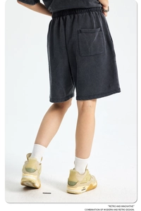 Rear view of vintage washed heavy cotton shorts featuring elastic waist and back pocket