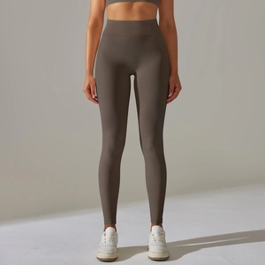 Close-up of high-waisted seamless yoga leggings with ribbed tummy control waistband