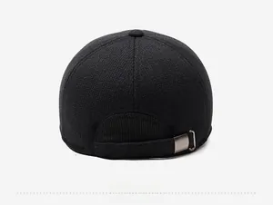 Rear view of winter thermal baseball cap showing thick woven texture and metal buckle