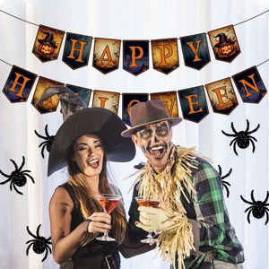 Happy Halloween banner with spider wall stickers in a festive party scene with costumes