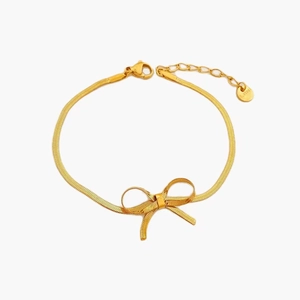 Elegant 18K gold-plated stainless steel bow necklace featuring a snake chain and lobster clasp