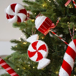 Christmas tree ornaments with red and white striped peppermint candy and canes
