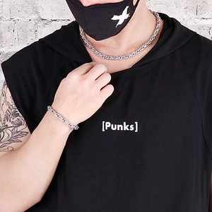 Men's silver stainless steel chunky chain necklace and bracelet set on male model
