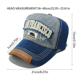 Detail of retro San Francisco embroidery and California bear patch on denim baseball cap