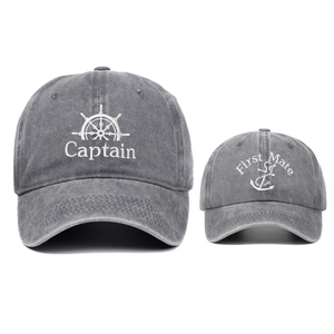 Matching Captain and First Mate embroidered washed cotton baseball caps in charcoal gray