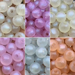 Luminous glitter beads for DIY jewelry making in multiple pastel colors