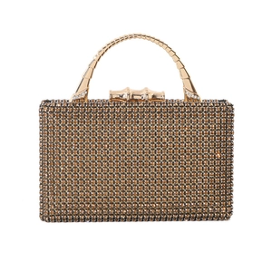 Luxurious gold evening clutch bag with sparkling rhinestones and metal bamboo handle