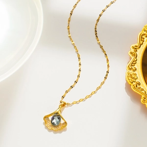 Golden titanium steel necklace with ginkgo leaf opal pendant and elegant crystal inlay