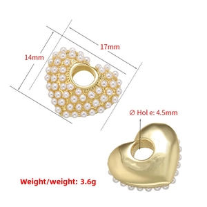 Detail of heart pearl pendant with gold metal base and 4.5mm hole for DIY jewelry