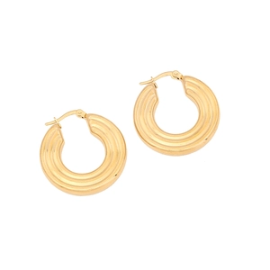 Macro shot of thick gold hoop earrings with spiral twisted texture and lever back