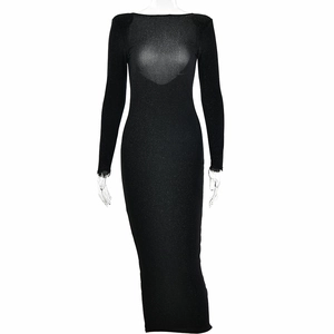 Detail of elegant black long sleeve bodycon dress with subtle glitter fabric finish