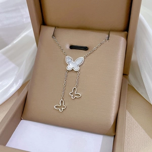Titanium steel butterfly necklace with mother-of-pearl pendant on leather jewelry box