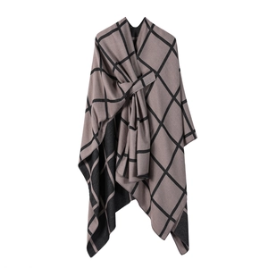 Brown grey knit poncho shawl with black check pattern and reversible solid black design