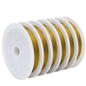 Set of 6 rolls of gold beading wire on white spools for DIY jewelry making and crafts
