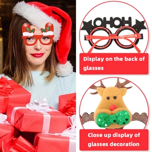 Detail view of festive Christmas glasses featuring glittery reindeer and glove designs