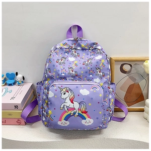 Detail of purple school backpack with unicorn and rainbow prints in a study scene