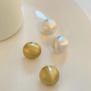 Minimalist brushed metal ball stud earrings in gold and silver finish for women