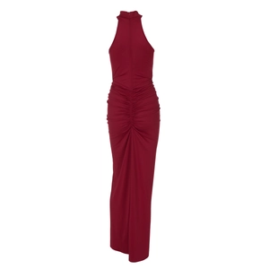 Detail of deep red halter dress featuring elegant back zipper and ruching textures