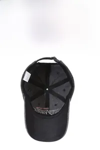 Detail view of 100% cotton washed baseball cap interior with metal buckle and logo label