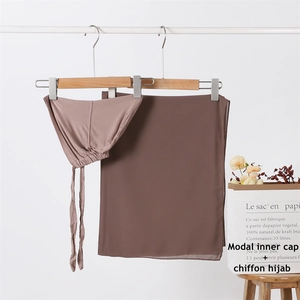 Brown modal inner cap and chiffon hijab scarf set displayed on hangers with floral decor