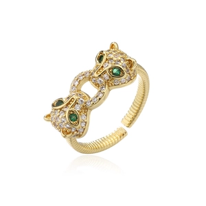 Adjustable 18K gold-plated leopard ring with micro-pave white crystals and green stone eyes