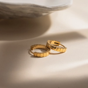 Classic 18K gold plated stainless steel ribbed hoop earrings with geometric texture