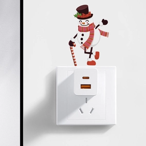 Close-up of white dual-port USB A and Type-C power adapter plugged into a wall outlet