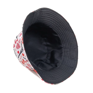 White bucket hat with Paris Eiffel Tower and red heart prints, shown in a 45-degree angle view