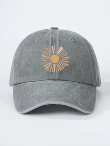 Detailed front view of washed dark grey baseball cap with sunburst graphic and six-panel crown