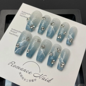 Handmade long trapezoid press-on nails with blue marble gradient and crystals