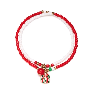 Detail of Christmas beaded bracelet featuring red and white beads with a gift box charm