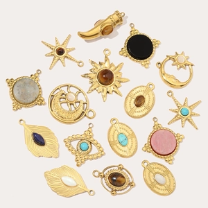 Minimalist gold pendants collection with sun moon star elements and natural stones