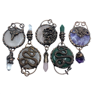 Retro bronze crystal pendants set with quartz stones and antique animal charms
