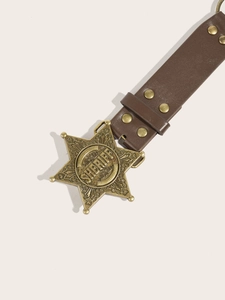 Close-up of vintage brown leather belt featuring a golden sheriff star buckle with engraving