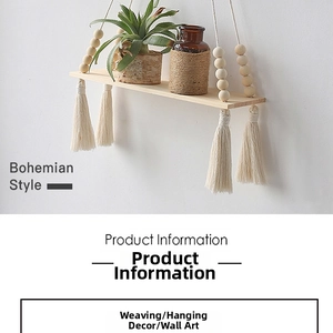 Detail of bohemian woven cotton rope wall shelf with wooden beads and hanging tassels