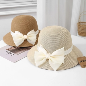 Chapeau de soleil en paille style français avec grand nœud en organza et anti-UV